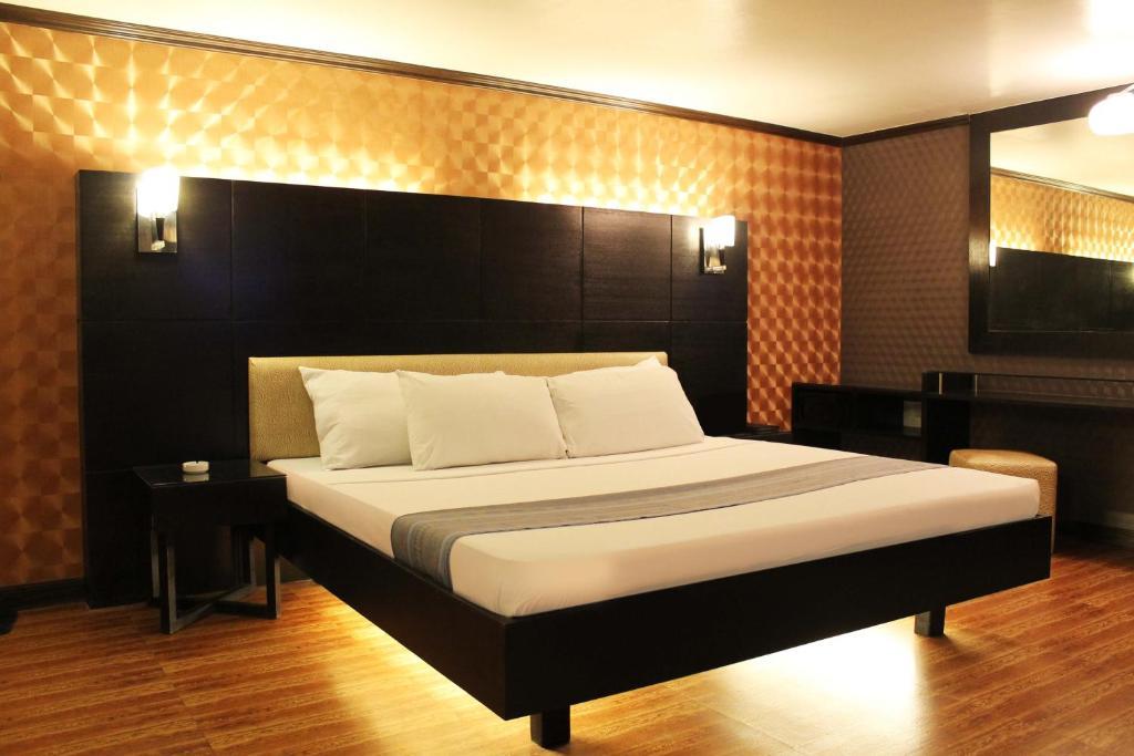 Hotel 2016 Манила Номер фото